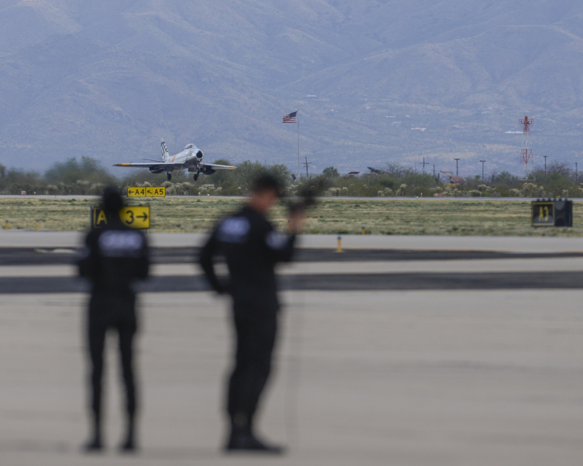 An F-86 Sabre takes off during the 2016 Heritage Flight Training and Certification Course at Davis-Monthan Air Force Base, Ariz., March 6, 2016. Established in 1997, the HFTCC certifies civilian pilots of historic military aircraft and U.S. Air Force pilots to fly in formation together during the upcoming air show season. (U.S. Air Force photo by Senior Airman Chris Massey/Released)