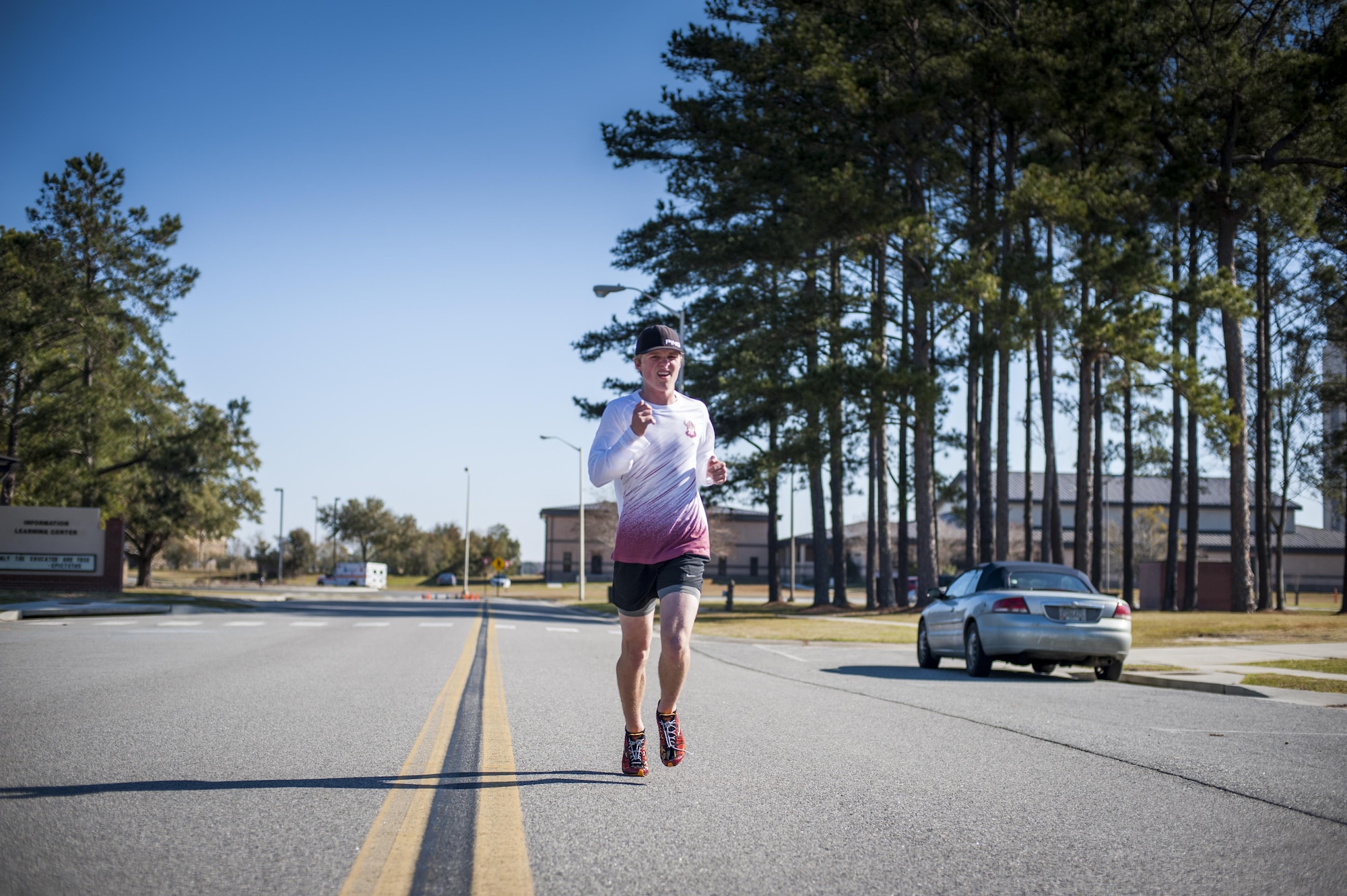 Carson Locke, son of U.S. Air Force Col. Joseph Locke, 93d Air Ground Operations Wing commander, runs through the finish line during the Family & Furry Friends 5k, March 5, 2016, at Moody Air Force Base, Ga. Carson was the first to finish the 5k in just over 23 minutes. (U.S. Air Force photo by Airman 1st Class Lauren M. Johnson)