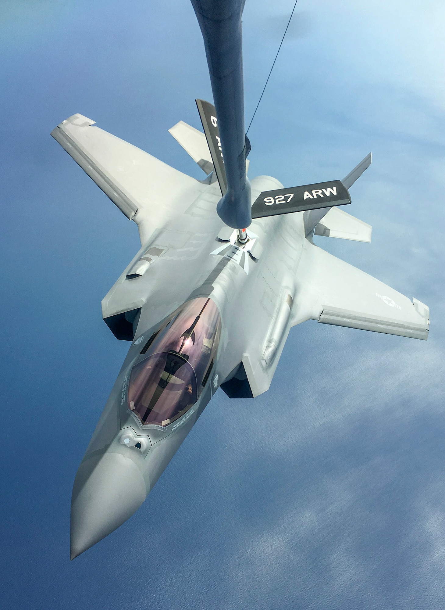 An Eglin Air Force Base F-35A Lightning II receives fuel from a KC-135 Stratotanker assigned to MacDill AFB approximately 100 miles off the Gulf Coast March 2, 2016 following the 58th Fighter Squadron's first successful munition employment at a nearby range. Airmen from the 33rd Fighter Wing were able to complete modifications to the aircraft ahead of schedule to enable the use of inert munitions instead of simulated weapons, advancing the fifth-generation fighter’s syllabus and ensuring pilots receive the most comprehensive training before they support a combat-coded F-35A unit. (U.S. Air Force photo/ Capt. Hope R. Cronin)