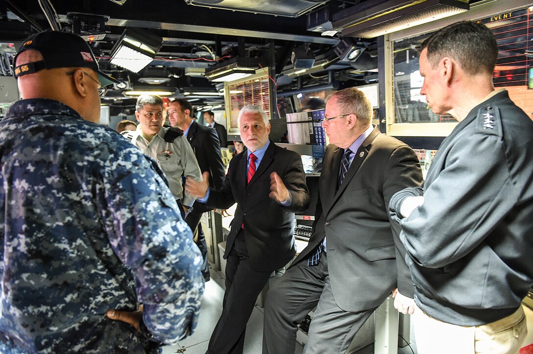 Deputy Defense Secretary Bob Work, second from right, listens to a brief aboard the USS Stout on Naval Station Norfolk, Va., March 8, 2016. DoD photo by Army Sgt. 1st Class Clydell Kinchen