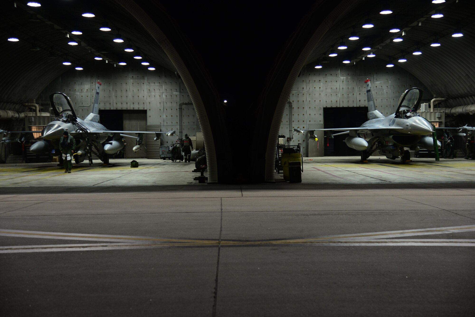 Airmen from the 36th Fighter Squadron and 36th Aircraft Maintenance Unit prepare F-16 Fighting Falcons for the first simulated combat sorties of Beverly Midnight 16-01 at Osan Air Base, Republic of Korea March 9, 2016. Team Osan is participating in the exercise which is designed to test American forces in the ROK on their mission readiness in the event of an emergency or wartime environment. (U.S. Air Force photo by Staff Sgt. Rachelle Coleman/Released)
