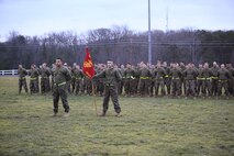 Marines with React Force Company, Chemical Biological Incident Response Force (CBIRF), U.S. Marine Forces Command (MARFORCOM), stand in formation prior to a battalion-wide physical training (PT) session. CBIRF Corporals led the battalion in a PT event ranging from pushups and lunges to buddy drags and fireman carry drills the morning before their graduation from Corporals Leadership Course, Feb. 26, 2016. The noncommissioned officers completed the 3 week course curriculum that included sword and guidon manual, land navigation, Marine Corps promotion system for sergeants and below and other small unit leader skills and traits. (Official USMC Photos by Sgt. Santiago G. Colon Jr./Released)
