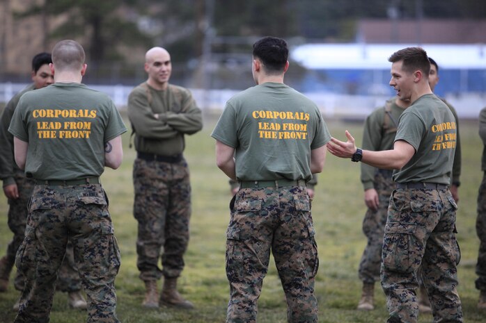 Corporals with Chemical Biological Incident Response Force (CBIRF), U.S. Marine Forces Command (MARFORCOM) led CBIRF in a battalion-wide physical training session ranging from pushups and lunges to buddy drags and fireman carry drills the morning before their graduation from Corporals Leadership Course, Feb. 26, 2016. The noncommissioned officers completed the 3 week course curriculum that included sword and guidon manual, land navigation, Marine Corps promotion system for sergeants and below and other small unit leader skills and traits.(Official USMC Photo by Sgt. Santiago G. Colon Jr./Released)
