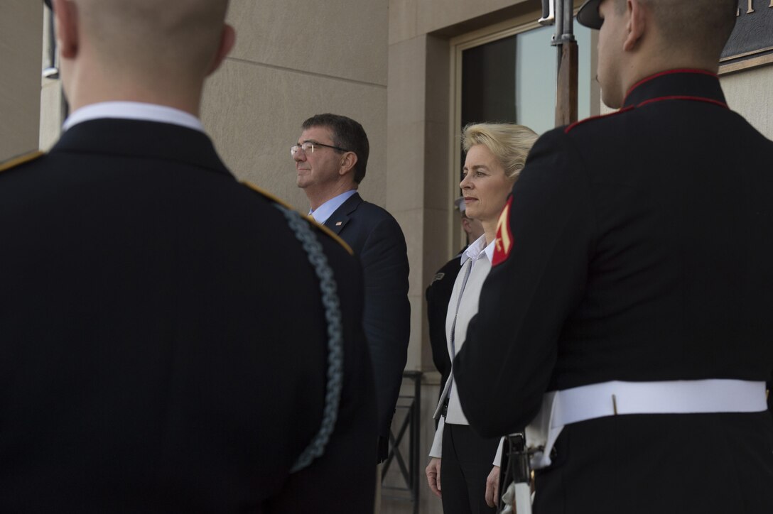 Defense Secretary Ash Carter and German Defense Minister Ursula von der Leyen stand during an enhanced honor cordon at the Pentagon, March 8, 2016. DoD photo by Air Force Senior Master Sgt. Adrian Cadiz