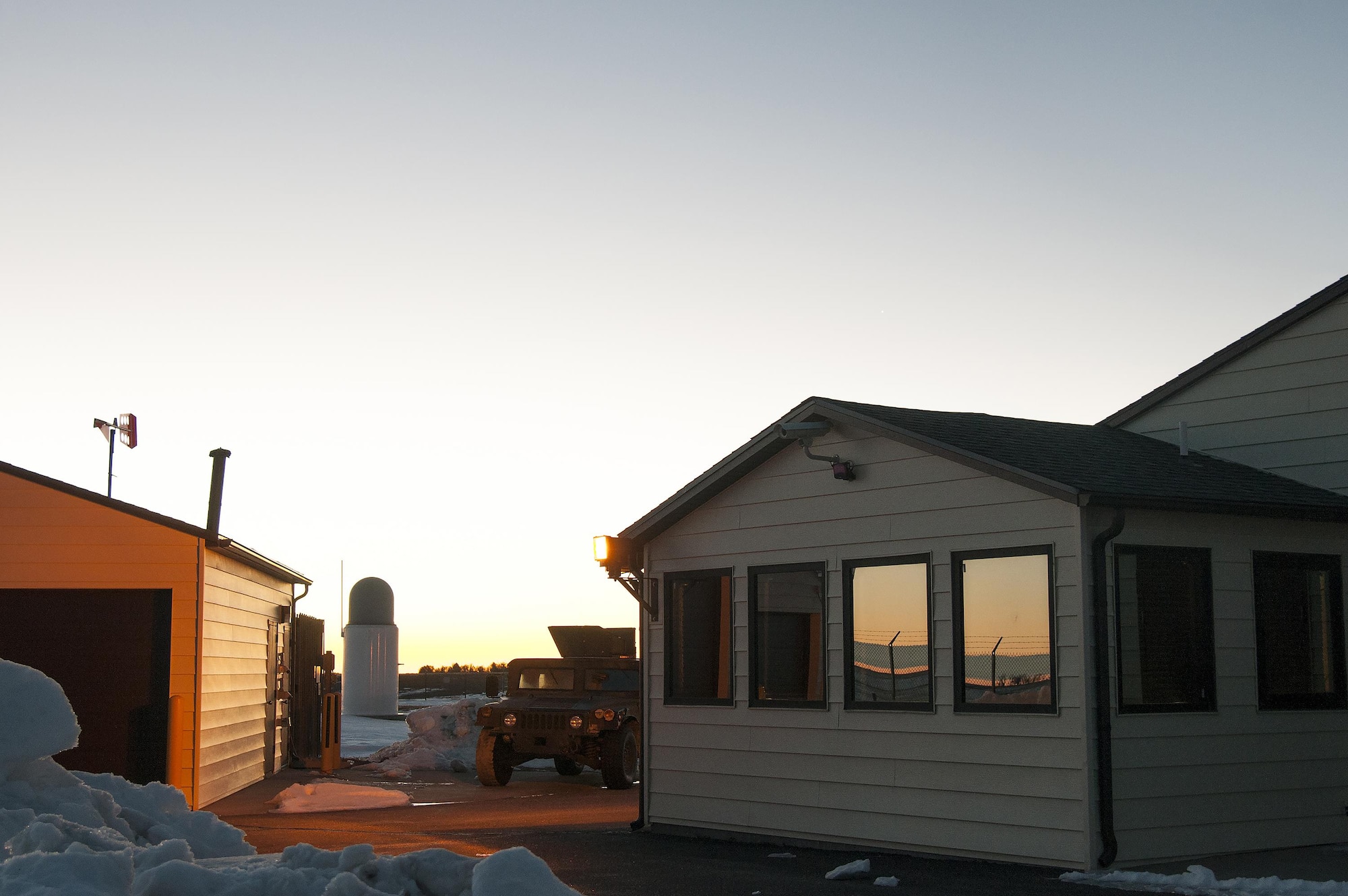 The sun rises at a Missile Alert Facility in the F.E. Warren Air Force Base, Wyo., missile complex, Feb. 9, 2016. MAFs house the missile crews who command Minuteman III ICBMs. (U.S. Air Force photo by Senior Airman Jason Wiese)