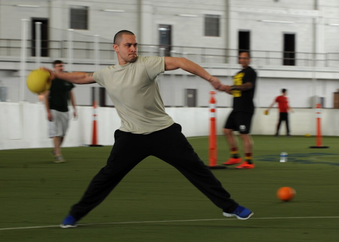 An Airman from the 28th Logistics Readiness Squadron prepares to throw a ball during the Air Force Assistance Fund kick-off at Ellsworth Air Force Base, S.D., Feb. 29, 2016. The programs offered by AFAF are the Air Force Enlisted Village, LeMay Foundation, Air Force Charitable Foundation and the Air Force Aid Society. (U.S. Air Force photo by Airman 1st Class Denise M. Nevins/Released)