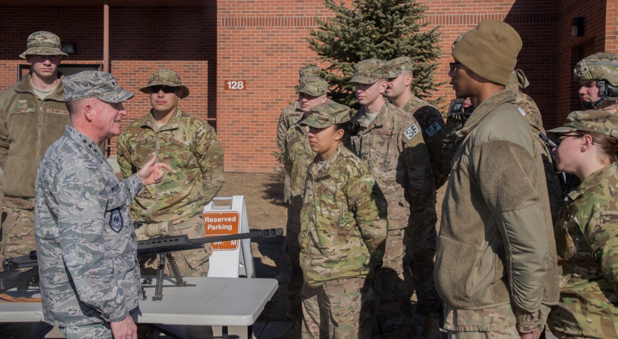 Lt. Gen. Stephen Wilson, deputy commander of U.S. Strategic Command, talks to 91st Security Forces Group Airmen at Minot Air Force Base, N.D., Feb. 26, 2016. During his visit with the 91st SFG, Wilson was shown a variety of demonstrations to include convoy operations and various aspects of missile field activity. (U.S. Air Force photo/Airman 1st Class Christian Sullivan)