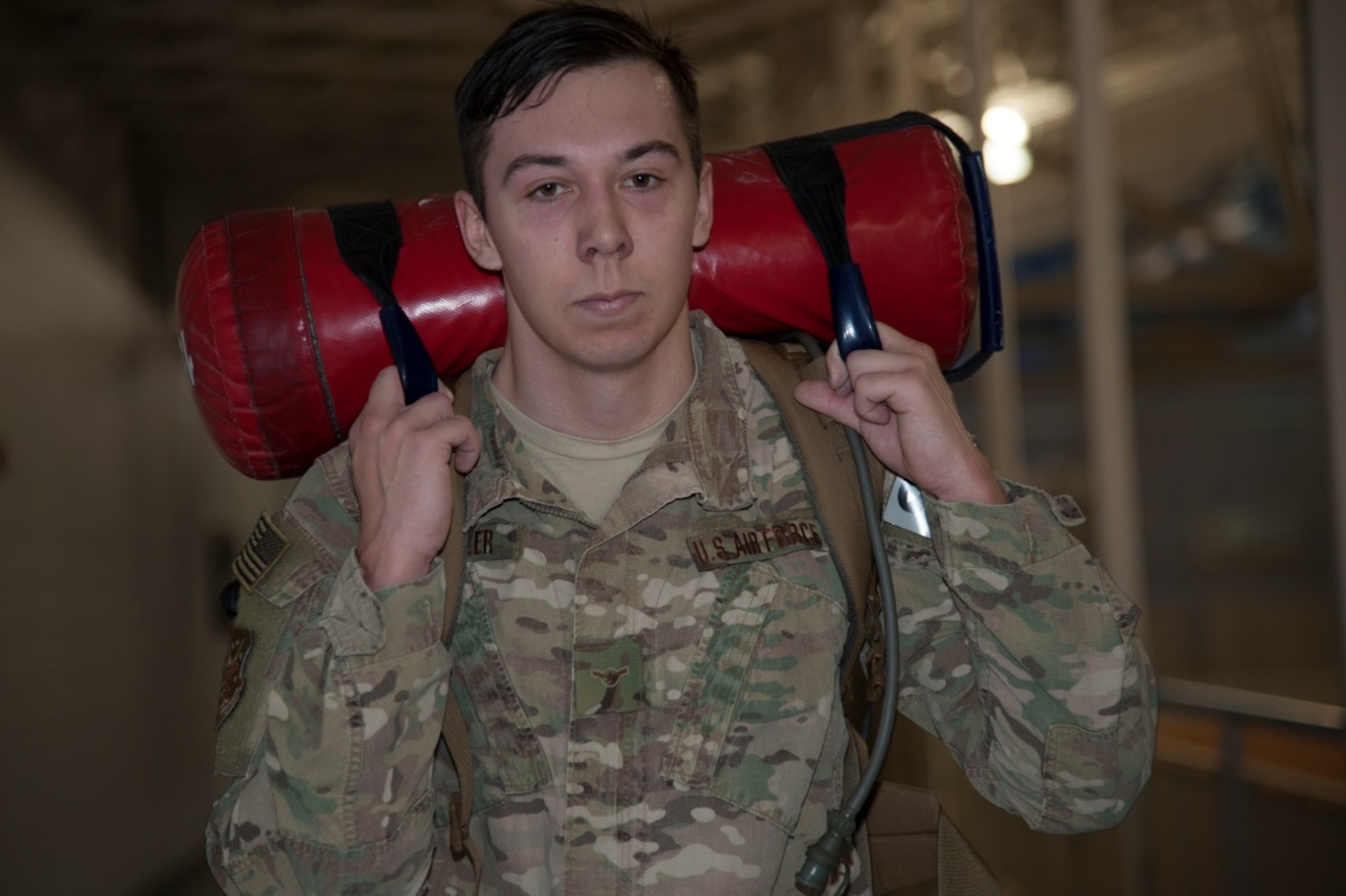 Airman Austin Wheeler, 791st Missile Security Forces Squadron missile response force member, marches with extra weight on his back to prepare for the Bataan Death March Ruck at Minot Air Force Base, N.D., Jan. 6, 2016. Participants have been preparing for the ruck since October and will depart for White Sands N.M. where the ruck will take place, in March. (U.S. Air Force photo/Airman 1st Class Christian Sullivan)