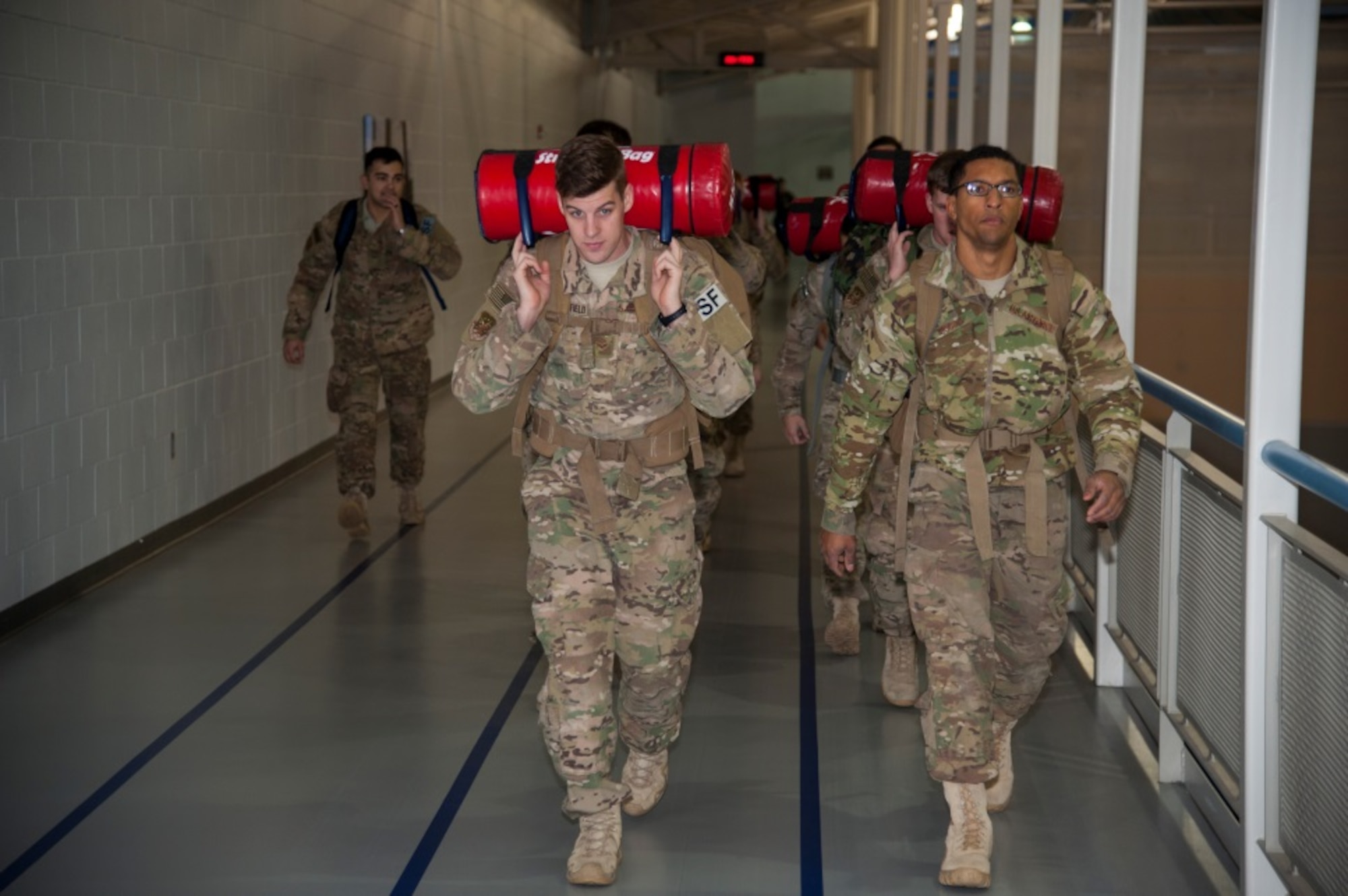 Members of the 91st Security Forces Group ruck during training at Minot Air Force Base, N.D., Jan. 6, 2016. Participants have been preparing for the ruck since October and will depart for White Sands N.M., where the Bataan Memorial Death March Ruck will take place, in March. (U.S. Air Force photo/Airman 1st Class Christian Sullivan)