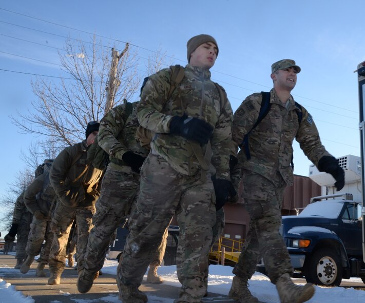 Members of the 91st Security Forces Group ruck during training at Minot Air Force Base, N.D., Feb. 12, 2016. Participants have been preparing for the ruck since October and will depart for White Sands N.M., where the Bataan Memorial Death March Ruck will take place, in March. (U.S. Air Force photo/Airman 1st Class Christian Sullivan)