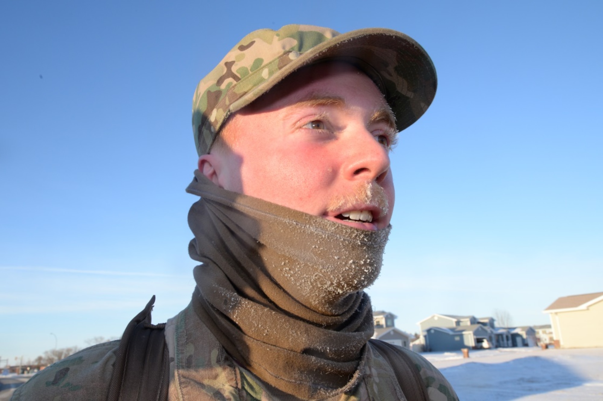 Airman 1st Class Conner Gallagher, 791st Missile Security Forces Squadron missile response force member, takes a break during ruck march training at Minot Air Force Base, N.D., Feb. 12, 2016. Airman is one of many 91st SFG Airmen participating in the Bataan Memorial Death March Ruck, which will take place at Whtie Sands Misile Range, N.M. (U.S. Air Force photo/Airman 1st Class Christian Sullivan)