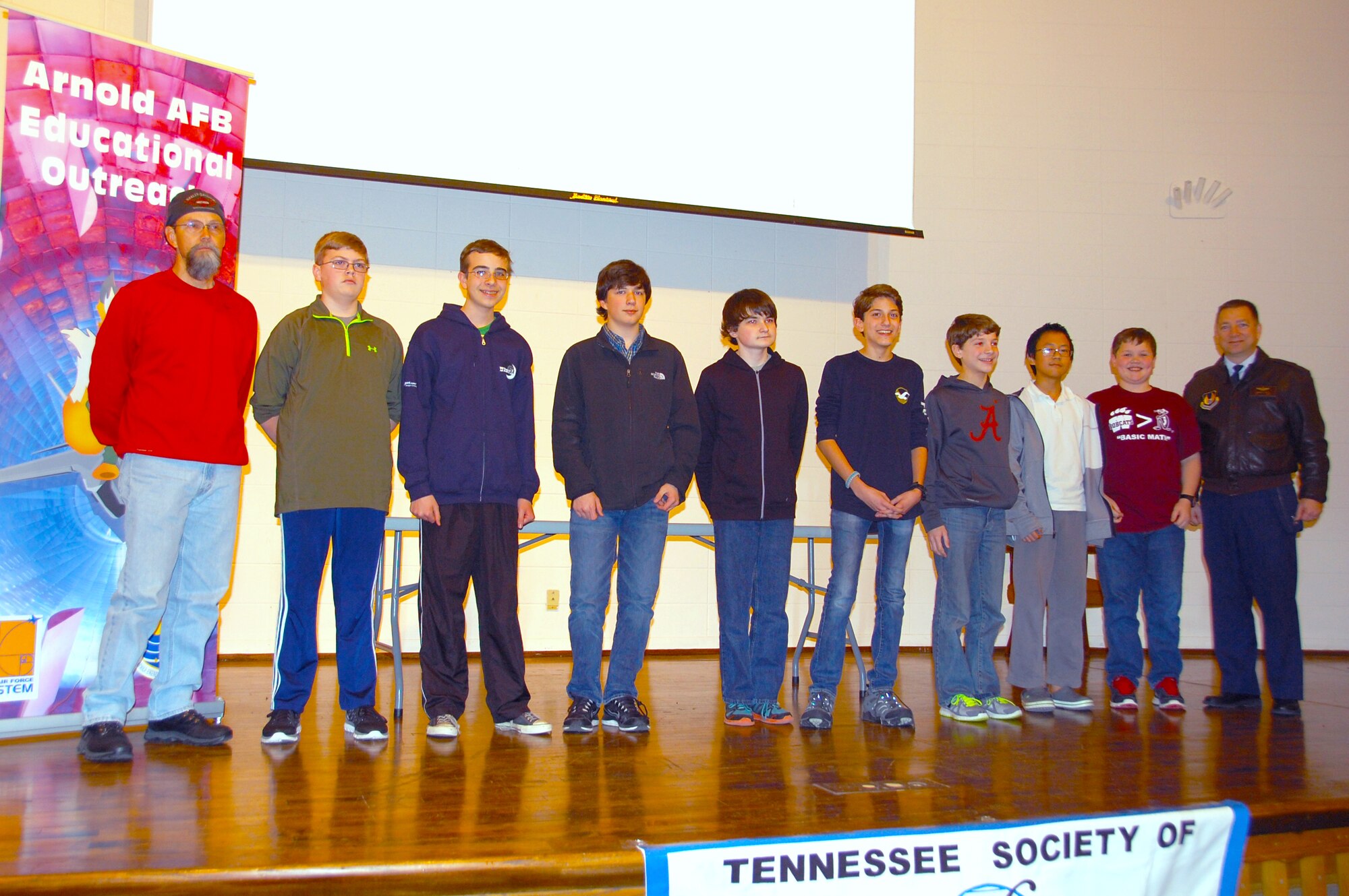 Pictured here are the top scoring winners at the MathCounts® competition Feb. 6 at the University of Tennessee Space Institute, who combined to create the Tullahoma Team who will compete in the MathCounts state level competition. Shown left to right is Coach Trent Stout; team members Jacob Howell, Trace Baxter, Landon Boone, Patrick Watts, Spencer Yoder, Sam Robinson, Tiger Wang and Will Arnett; and Col. Timothy West with AEDC. (Courtesy photo)