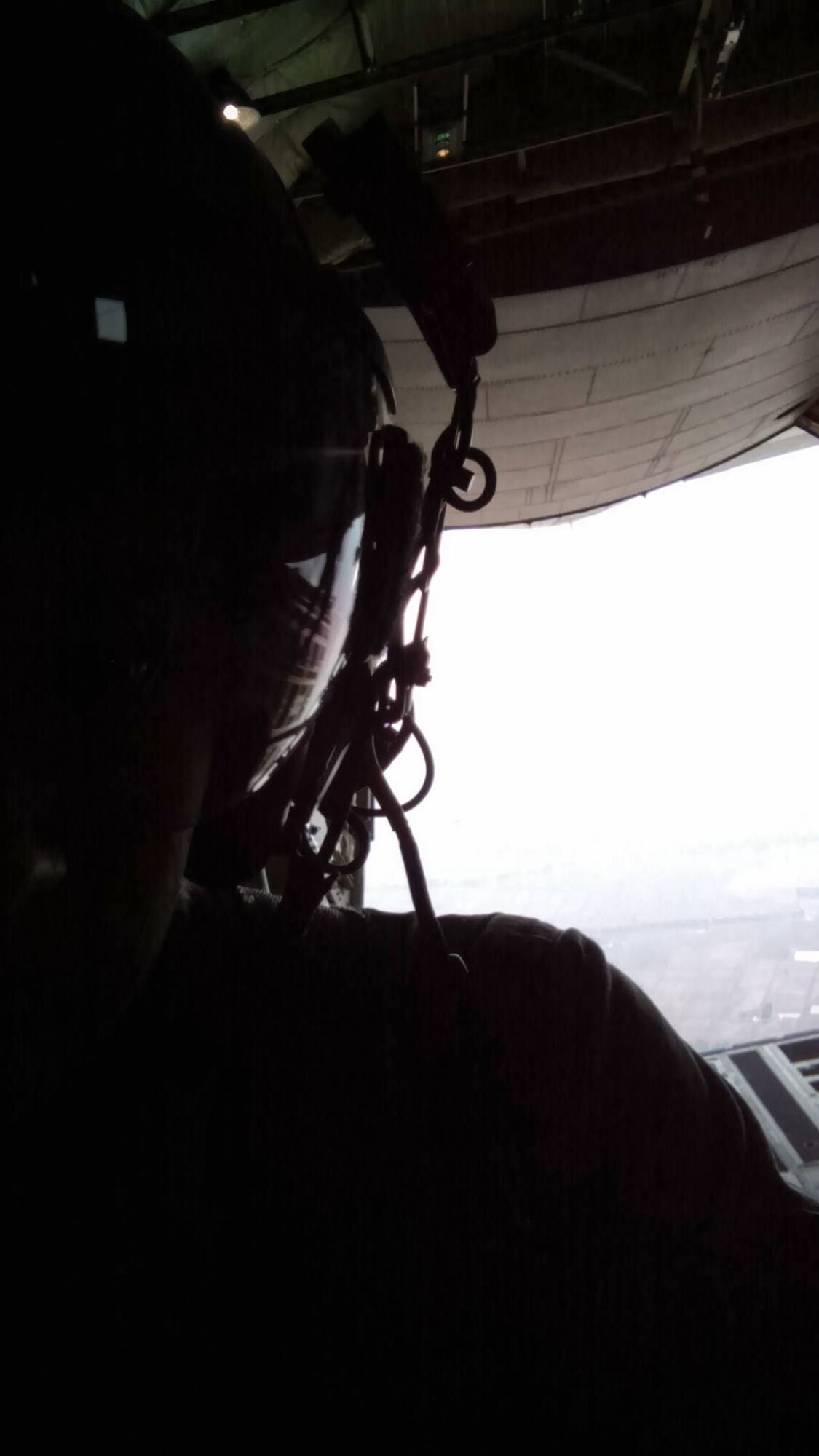 A 143d Airlift Wing C-130J Super Hercules loadmaster observes the air drop operations  during exercise Cobra Gold 2016 an annual Thai-U.S. co-sponsored joint and multinational exercise. Photo provided by Staff Sergeant Zachary Walker, 143d Maintenance Group