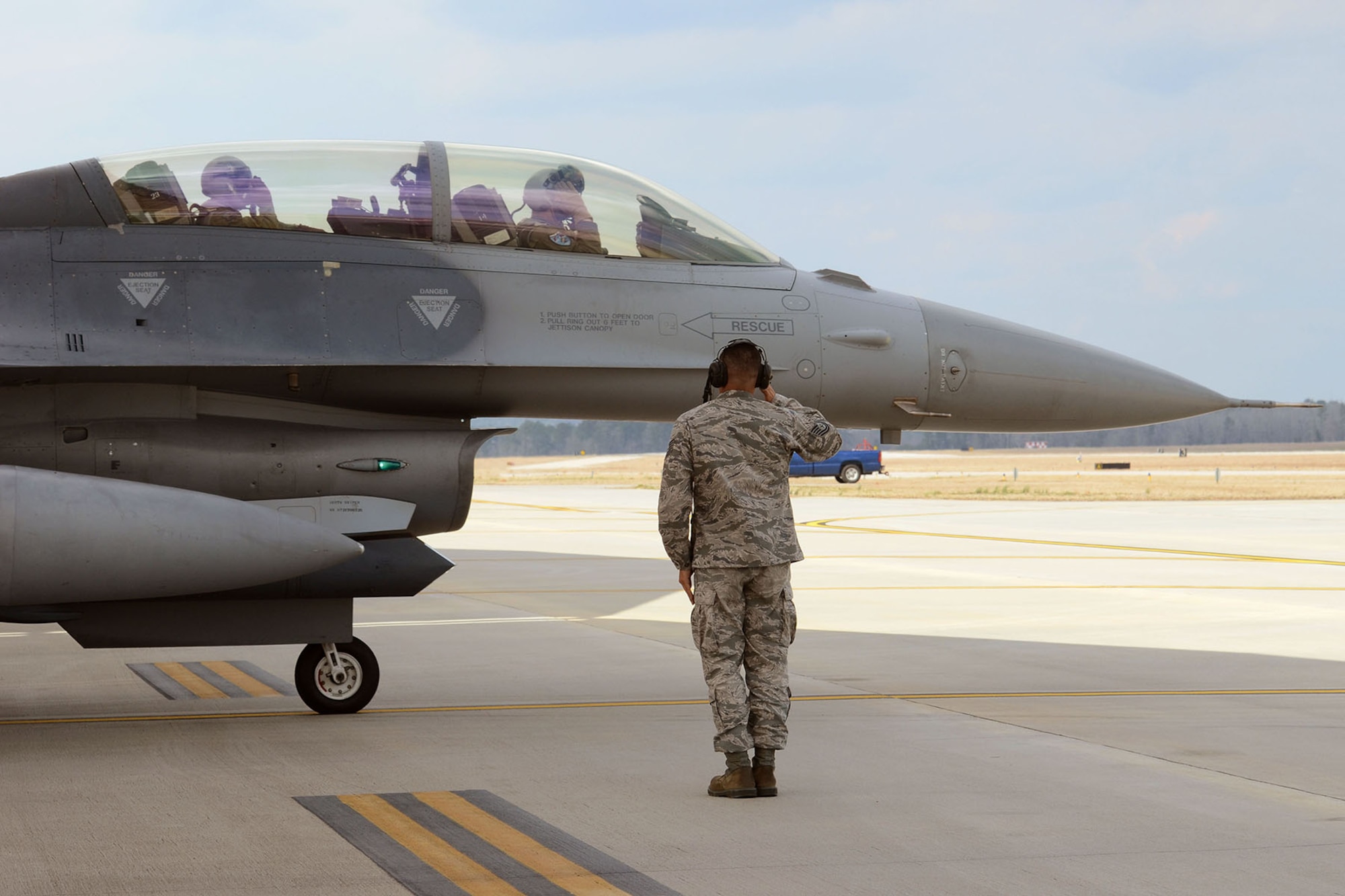 Canadian Forces Brig. Gen. Alain Pelletier, deputy commander Continental United States NORAD Region (CONR), receives and orientation flight on an F-16 Fighting Falcon fighter jet accompanied by Lt. Col. Ian Toogood, commander of the 169th Aerospace Control Alert Squadron, during his visit to the South Carolina Air National Guard's 169th Fighter Wing at McEntire Joint National Guard Station, Mar. 1, 2016. During his visit, Brig. Gen. Pelletier spoke to wing leadership about its homeland defense mission and the relationship it has with the NORAD air component as it is tasked through CONR to ensure North American airspace control. The 169th FW has provided support for numerous CONR training and air defense events in past years. (U.S. Air National Guard photo by Senior Airman Ashleigh S. Pavelek) 