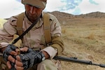 Peshmerga soldier loads ammunition into magazine in preparation for squad-based training near Erbil, Iraq, October 14, 2015, as part of Combined Joint Task Force–Operation Inherent Resolve (U.S. Army/Tristan Bolden)