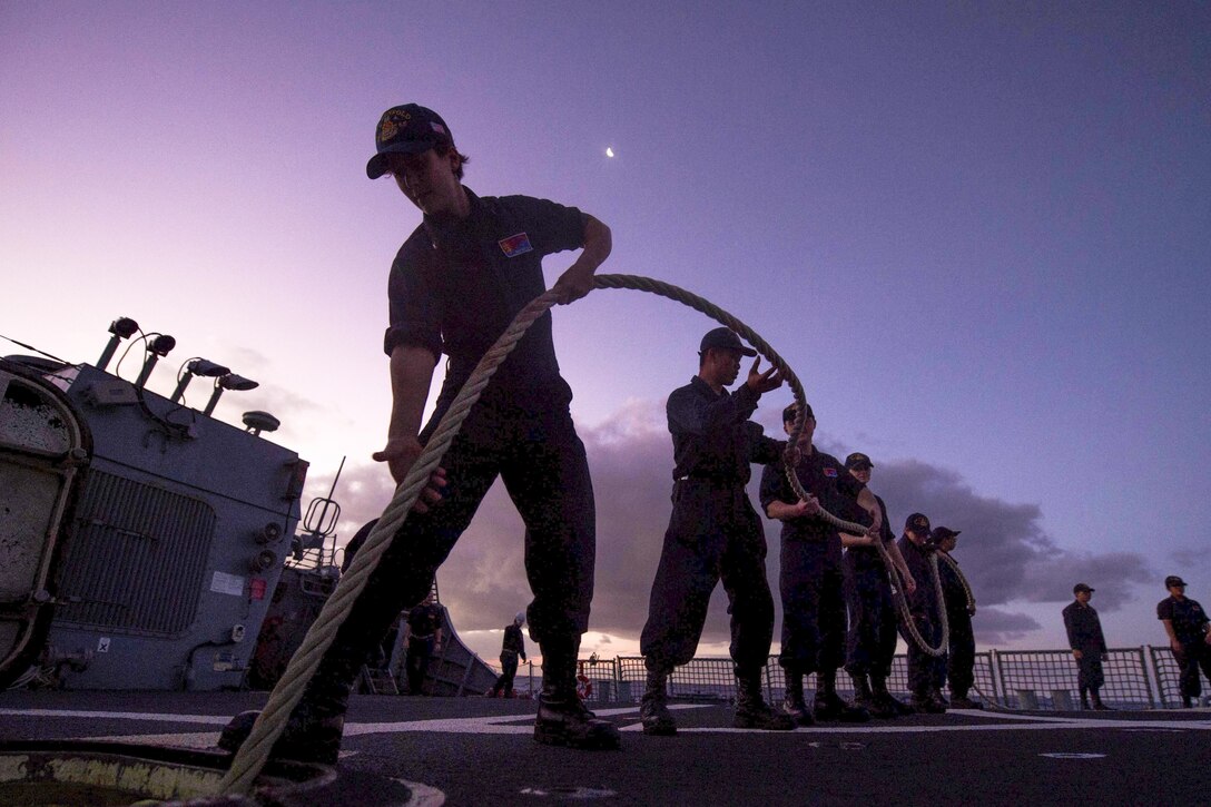 Sailors aboard the USS Benfold prepare for sea and anchor detail near Guam, March 4, 2016. The Benfold is in the 7th Fleet area of operations supporting security and stability in the Indo-Asian-Pacific region. Navy photo by Petty Officer 3rd Class Deven Leigh Ellis