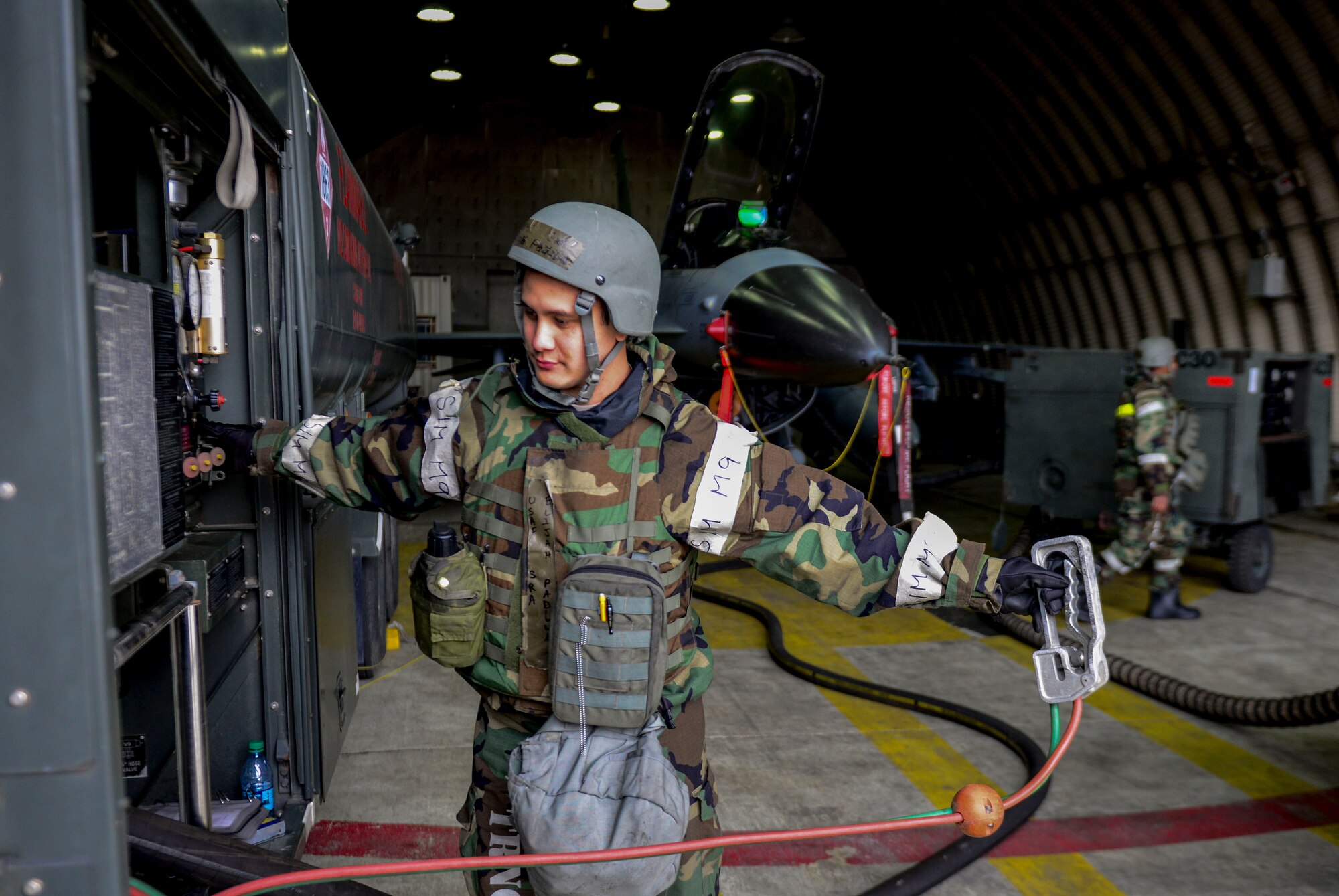 Senior Airman Elijah Padilla, 51st Logistics Readiness Squadron, adds fuel to F-16 Fighting Falcon during Beverly Midnight 16-01 exercise, March 8, 2016, at Osan Air Base, Republic of Korea. The challengingly high operational tempo of Beverly Midnight 16-01 along with the influx of additional personnel creates many logistical hurdles including the accurate allocation and timely delivery of fuels to aircraft. (U.S. Air Force photo by Staff Sgt. Jonathan Steffen/Released)