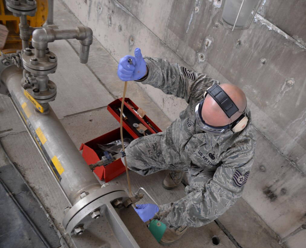 Tech. Sgt. Jason Bello, 51st Logistics Readiness Squadron fuels laboratory NCO in charge, performs a real-world fuel test during readiness exercise Beverly Midnight 16-01 March 8, 2016, at Osan Air Base, Republic of Korea. Throughout the exercise many Airmen from across base are meeting both real-world and exercise mission requirements in order to maintain fight tonight readiness. (U.S. Air Force photo by Staff Sgt. Benjamin Sutton/Released) 