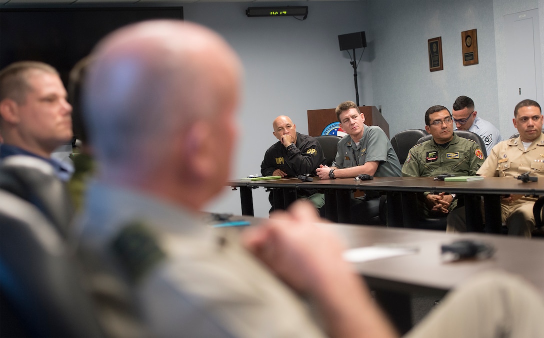 Liaison officers from partner nations meet with Marine Corps Gen. Joseph F. Dunford Jr., chairman of the Joint Chiefs of Staff, at Joint Interagency Task Force South in Key West, Fla., March 8, 2016. DoD photo by Navy Petty Officer 2nd Class Dominique A. Pineiro