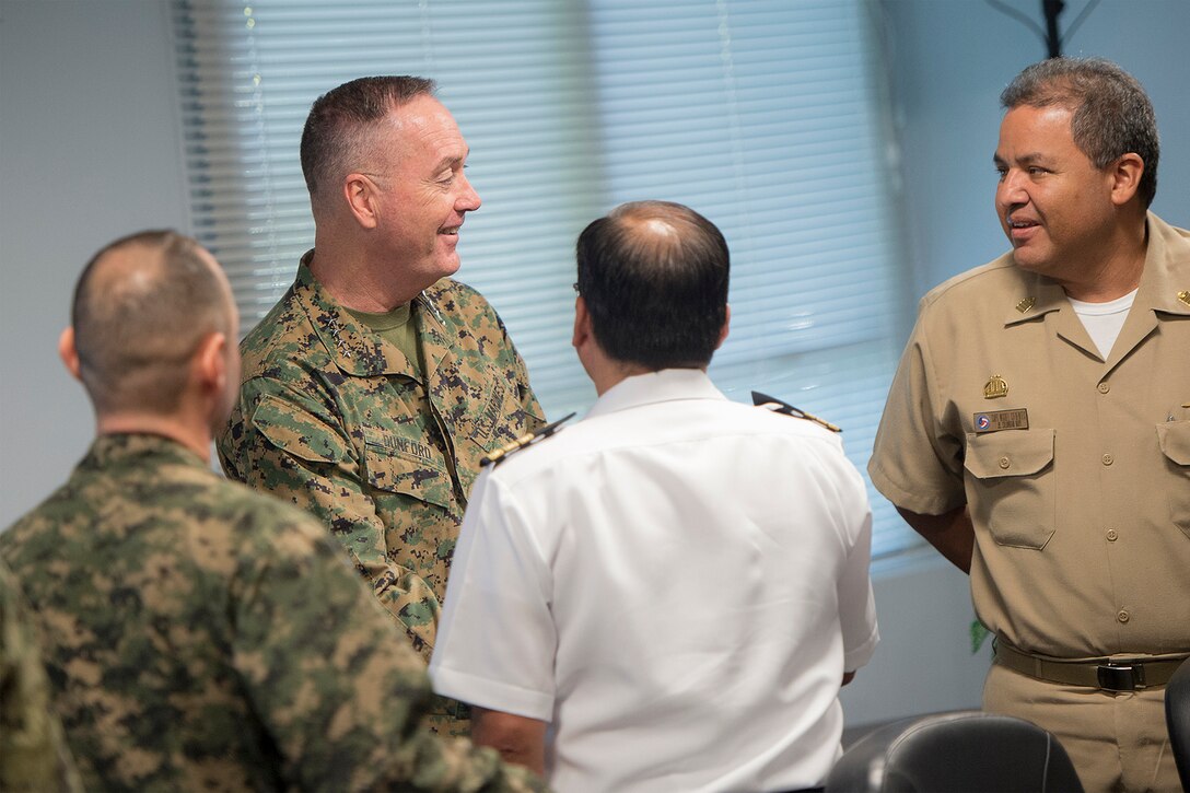 Marine Corps Gen. Joseph F. Dunford Jr., chairman of the Joint Chiefs of Staff, meets liaison officers from countries participating in Joint Interagency Task Force South in Key West, Fla., March, 8, 2016. The agency conducts international detection and monitoring operations, and intercepts illegal narcotics in support of national and partner nation security. DoD photo by Navy Petty Officer 2nd Class Dominique A. Pineiro