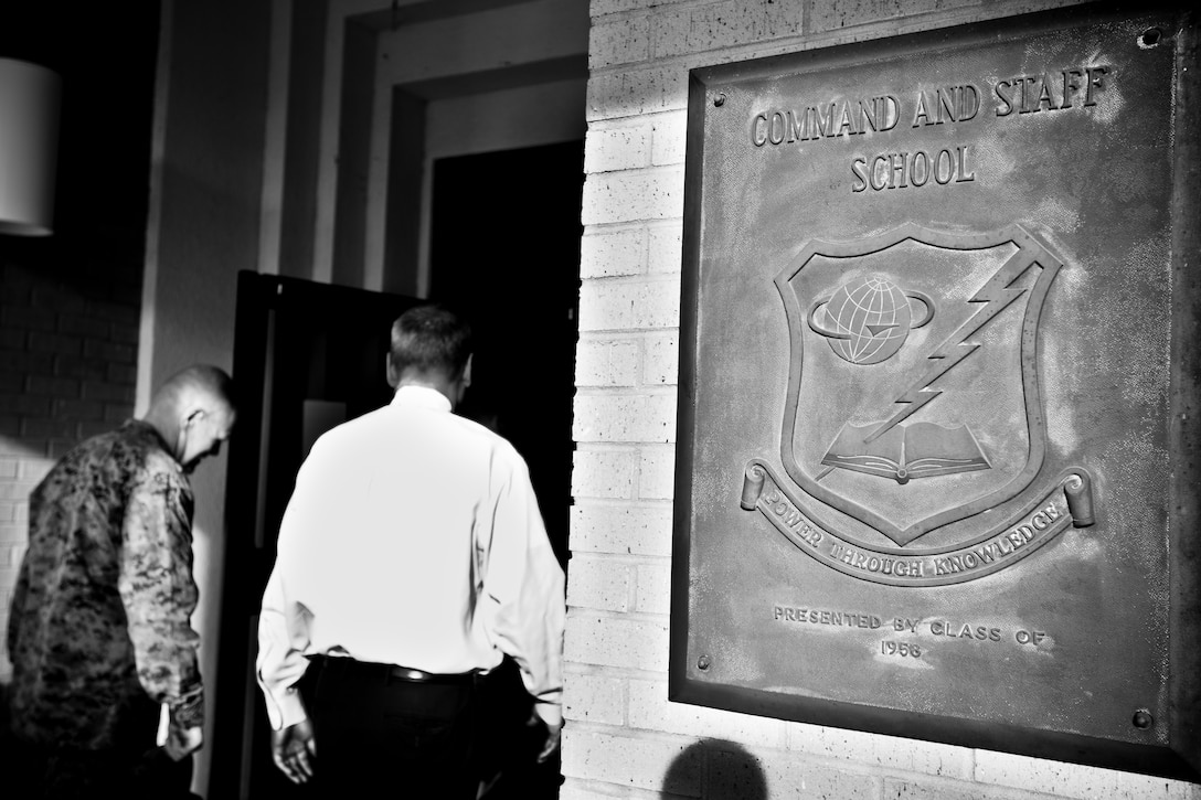 Commandant of the Marine Corps Gen. Robert B. Neller visits the Air Command and Staff College at Maxwell Air Force Base, Montgomery, Ala., March 8, 2016. Neller spoke to the students about the Corps current status, priorities and expectations of all senior leadership. (U.S. Marine Corps photo illustration by Staff Sgt. Gabriela Garcia/Released)