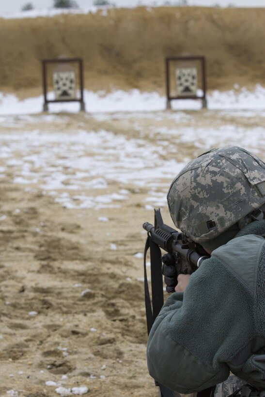 A U.S. Army Reserve Soldier within the 200th Military Police Command train on their assigned weapons during a qualification range at Joint Base McGuire-Dix-Lakehurst, N.J., March 4. (U.S. Army photo by Sgt. Jennifer Spiker)