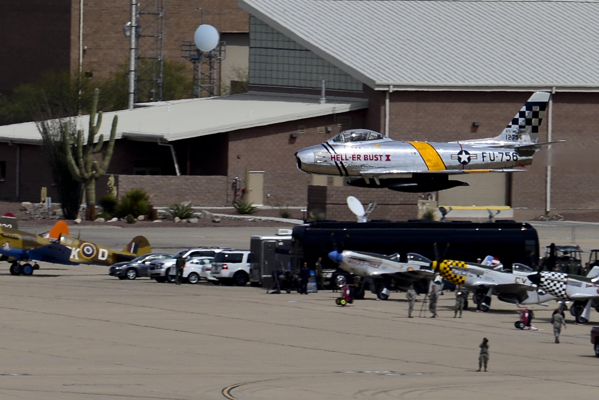An F-86 Sabre performs a high-speed pass during the 2016 Heritage Flight Training and Certification Course at Davis-Monthan Air Force Base, Ariz., March 6, 2016. The first production model of the F-86 flew in 1948 and supported the Strategic Air Command from 1949 to 1950. (U.S. Air Force photo by Senior Airman Chris Drzazgowski/Released)