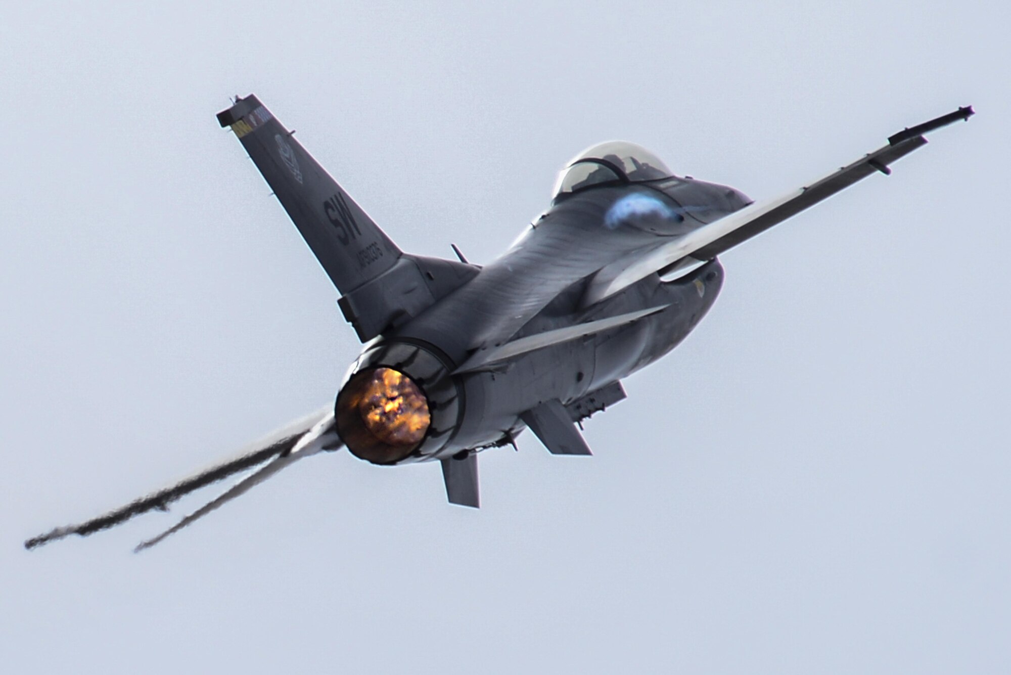 An F-16CM Fighting Falcon utilizes its afterburner during the 2016 Heritage Flight Training and Certification Course at Davis-Monthan Air Force Base, Ariz., March 6, 2016. It is highly maneuverable and has proven itself in air-to-air combat and air-to-surface attack. It provides a relatively low-cost, high performance weapon system for the United States and its allied nations. (U.S. Air Force photo by Senior Airman Chris Drzazgowski/Released)