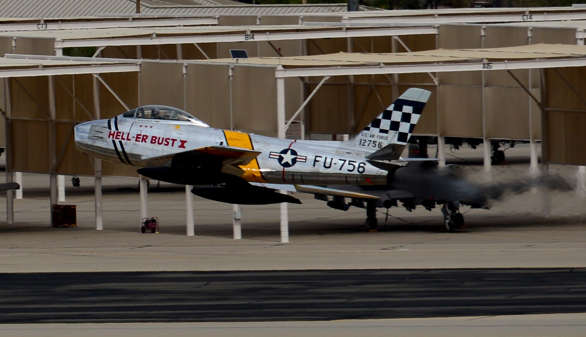 An F-86 Sabre performs a high-speed pass during the 2016 Heritage Flight Training and Certification Course at Davis-Monthan Air Force Base, Ariz., March 6, 2016. The first production model of the F-86 flew in 1948 and supported the Strategic Air Command from 1949 to 1950. (U.S. Air Force photo by Senior Airman Chris Drzazgowski/Released)