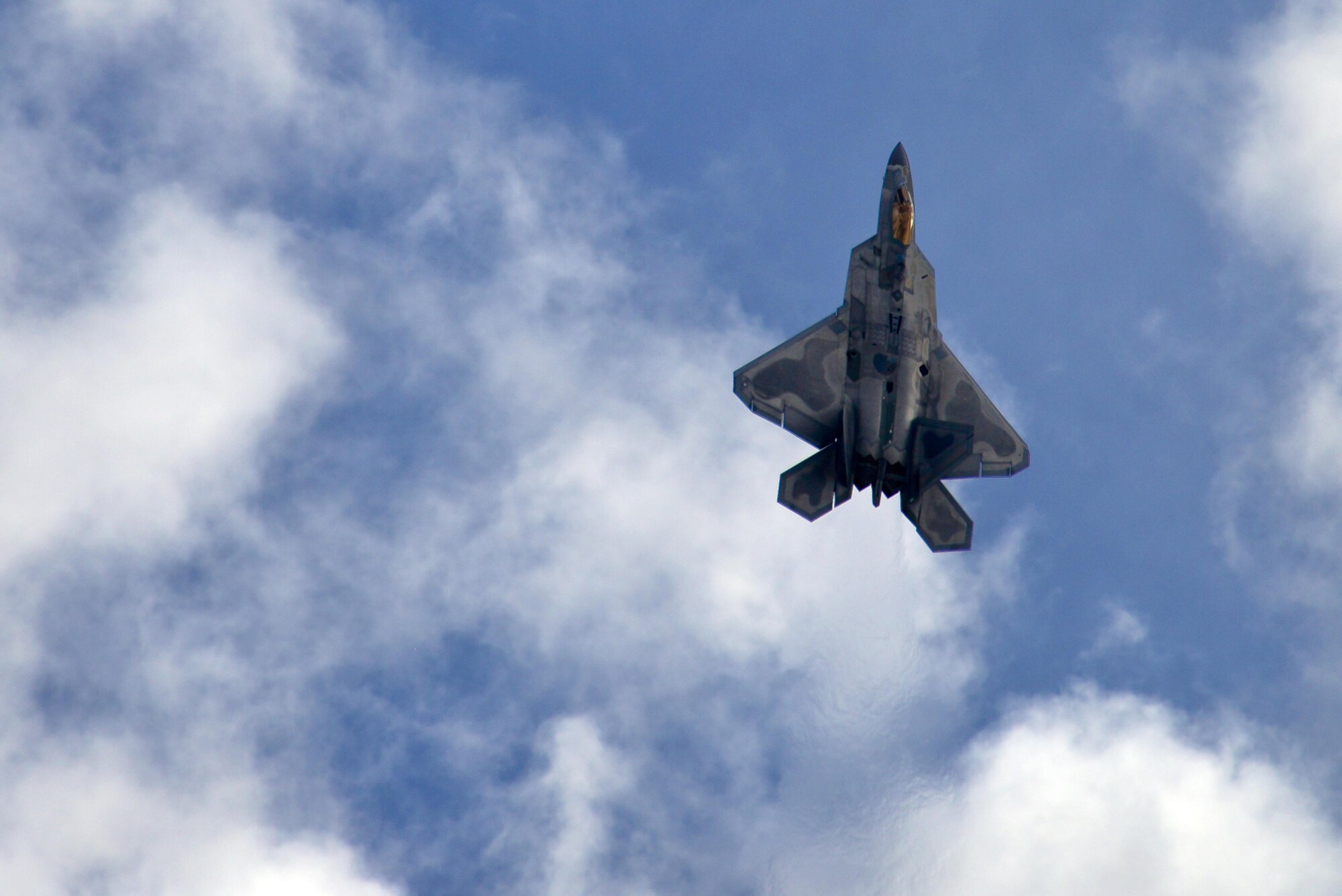 A U.S. Air Force F-22 Raptor performs a vertical climb during the 2016 Heritage Flight Training and Certification Course at Davis-Monthan Air Force Base, Ariz., March 6, 2016. The Raptor’s combination of stealth, supercruise, maneuverability and integrated avionics, coupled with improved supportability, represents an exponential leap in warfighting capabilities. (U.S. Air Force photo by Senior Airman Chris Drzazgowski/Released)