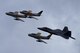Three F-86 Sabres and an F-22 Raptor fly in formation during the 2016 Heritage Flight Training and Certification Course at Davis-Monthan Air Force Base, Ariz., March 6, 2016. During the course, aircrews practice ground and flight training to enable civilian pilots of historic military aircraft and U.S. Air Force pilots of current fighter aircraft to fly safely in formations together. (U.S. Air Force photo by Senior Airman Chris Drzazgowski/Released)