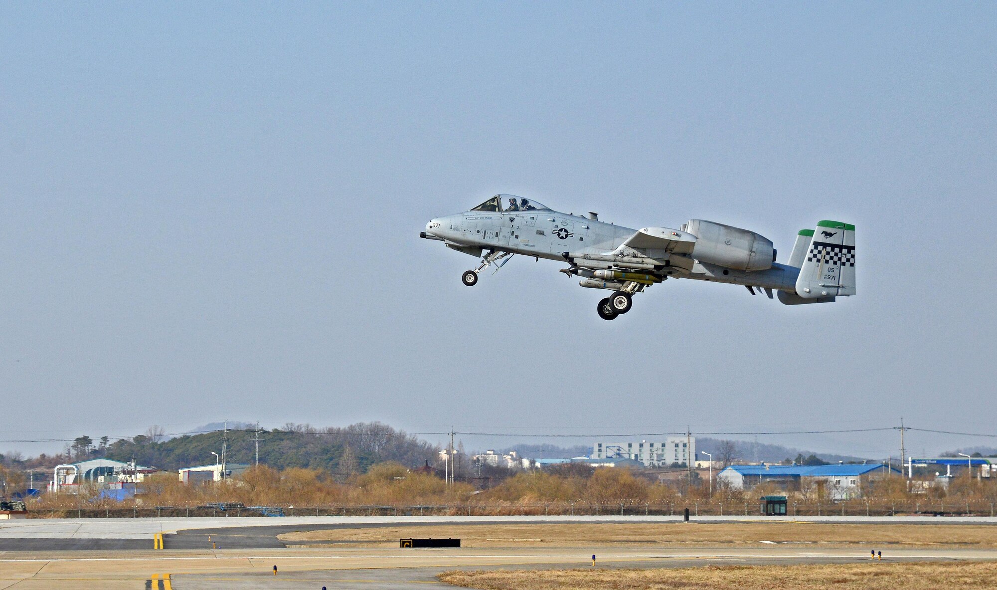 An A-10 Thunderbolt II takes off at Osan Air Base, Republic of Korea, March 9, 2016, during exercise Beverly Midnight 16-01 at Osan Air Base, Republic of Korea, March 9, 2016. This was the first A-10 to take off during BM 16-01, an exercise designed to test the warfighting capabilities of the units assigned to the 51st Fighter Wing with a focus on readiness, defending the base and executing flying operations.   (U.S. Air Force photo by Tech. Sgt. Travis Edwards/Released)