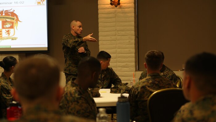 U.S. Marine Sgt. Maj. Troy E. Black speaks to lieutenants at the 1st Marine Logistics Group lieutenant seminar aboard Camp Pendleton, Calif., Feb. 25, 2016. Black is the sergeant major of 1st MLG. This seminar among first and second lieutenants in the Group was designed to garner knowledge and foster the camaraderie within the ranks, forming confident and decisive leaders. The seminar had two sessions in February and will continue at least bi-annually. (U.S. Marine Corps photo by 1st Lt. Allison Burgos/Released)