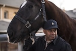 Staff Sgt. Edward Montgomery, Joint Base San Antonio-Fort Sam Houston Caisson Section military honors platoon sergeant, walks JBSA-Caisson horse Copeland to a trailer Feb. 5 at JBSA-Fort Sam Houston. Montgomery joined the JBSA-Fort Sam Houston Caisson Section in 2013 and is responsible for training new soldiers to be honor guard members.