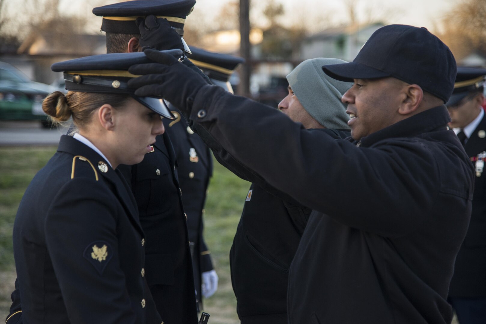 Staff Sgt. Edward Montgomery, Joint Base San Antonio-Fort Sam Houston Caisson Section military honors platoon sergeant, inspects honor guard member’s uniforms Feb. 5 at JBSA-Fort Sam Houston. As the platoon sergeant Montgomery ensures that honors are rendered with in a 67,000 square-mile area of South Texas.