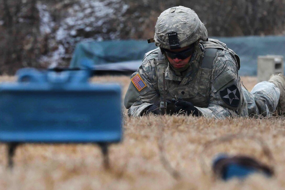 Army Spc. Javier Preciado runs through the procedures to use an M18A1 Claymore mine during at California Range, South Korea, March 2, 2016. Preciado is assigned to Company B, 2nd Battalion, 3rd Infantry Regiment, 2nd Stryker Brigade Combat Team. Army photo by Pfc. Elliott Page