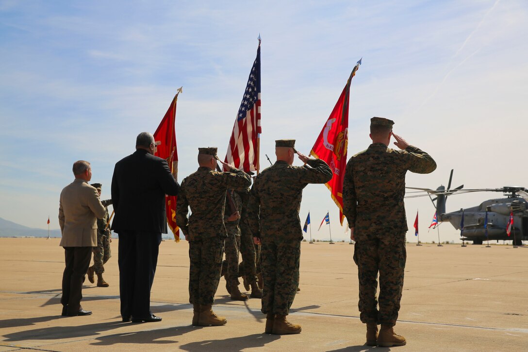 Col. Jason Woodworth (right), commanding officer of Marine Corps Air Station Miramar, Sgt. Maj. Michael Walton, sergeant major of MCAS Miramar, Sgt. Maj. Richard Charron and two former MCAS Miramar sergeants major salute during a pass and review near the end of Charron and Walton’s relief and appointment ceremony aboard MCAS Miramar, Calif., March 2. Charron relinquished command to Sgt. Maj. Michael Walton, former sergeant major of Marine Fighter Attack Squadron (VMFA) 232. (U.S. Marine Corps photo by Cpl. Alissa Schuning/Released)
