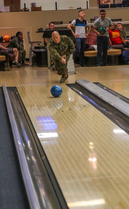 A participant in the Commanding General’s Cup Scratch Bowling Tournament bowls at the recreation center on Marine Corps Recruit Depot San Diego, March 8. The CG’s Cup holds several sports tournaments throughout the year including volleyball and basketball. The bowling tournament was open to any active duty military members and permanent personnel who work aboard the depot.