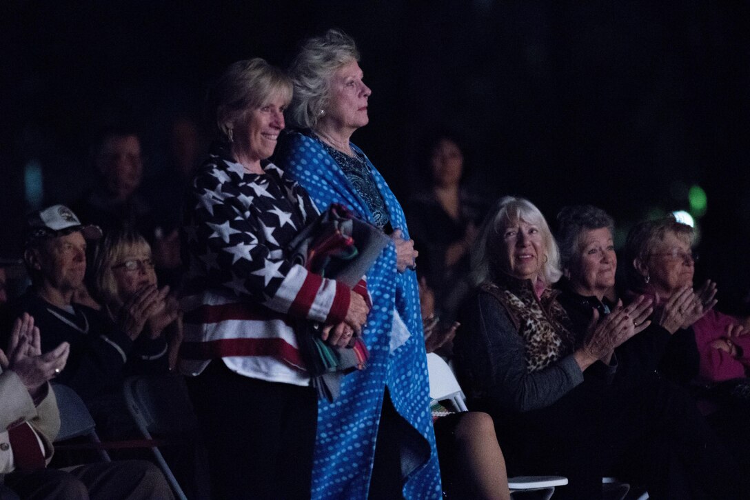 U.S. Armed Services veterans take to their feet while The Jazz Ambassadors play the Armed Forces Salute during a concert March 9, in Palm Springs, Calif. The Jazz Ambassadors is the U.S. Army’s official touring big band and are currently traveling the western U.S. on their spring concert tour. (U.S. Army photo by Sgt. 1st Class Joshua Johnson)