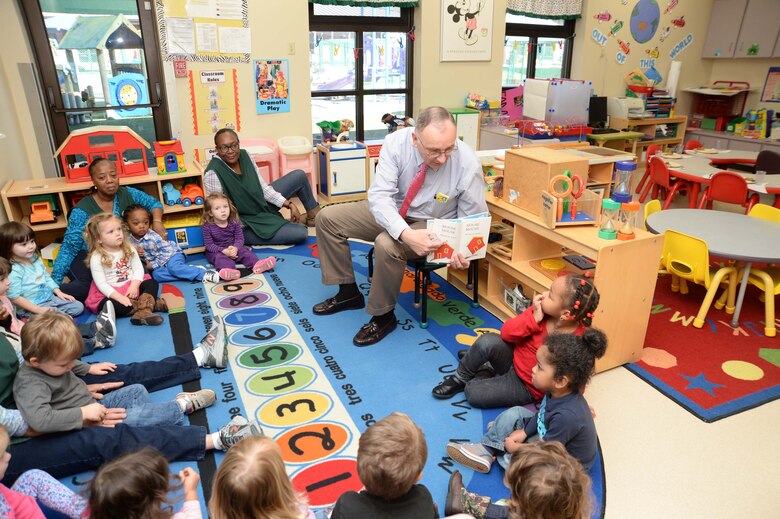 Kent Morrison, executive director, Marine Corps Logistics Base Albany, reads to Pre-K students at the installation’s Child Development Center during the annual Read Across America event, recently. The activities are held nationally to celebrate the birthday of author, illustrator Theodor Seuss Geisel, better known as Dr. Seuss.
