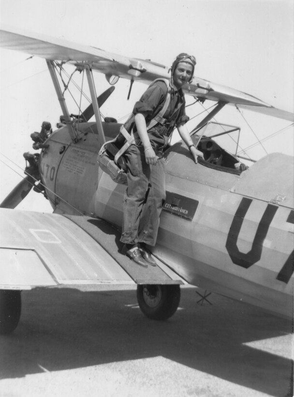 Bernice Haydu, a Women's Airforce Service Pilot, or WASP, during World War II, prepares to get into a Stearman Kaydet bi-plane during pilot training while wearing her parachute. (Courtesy photo)