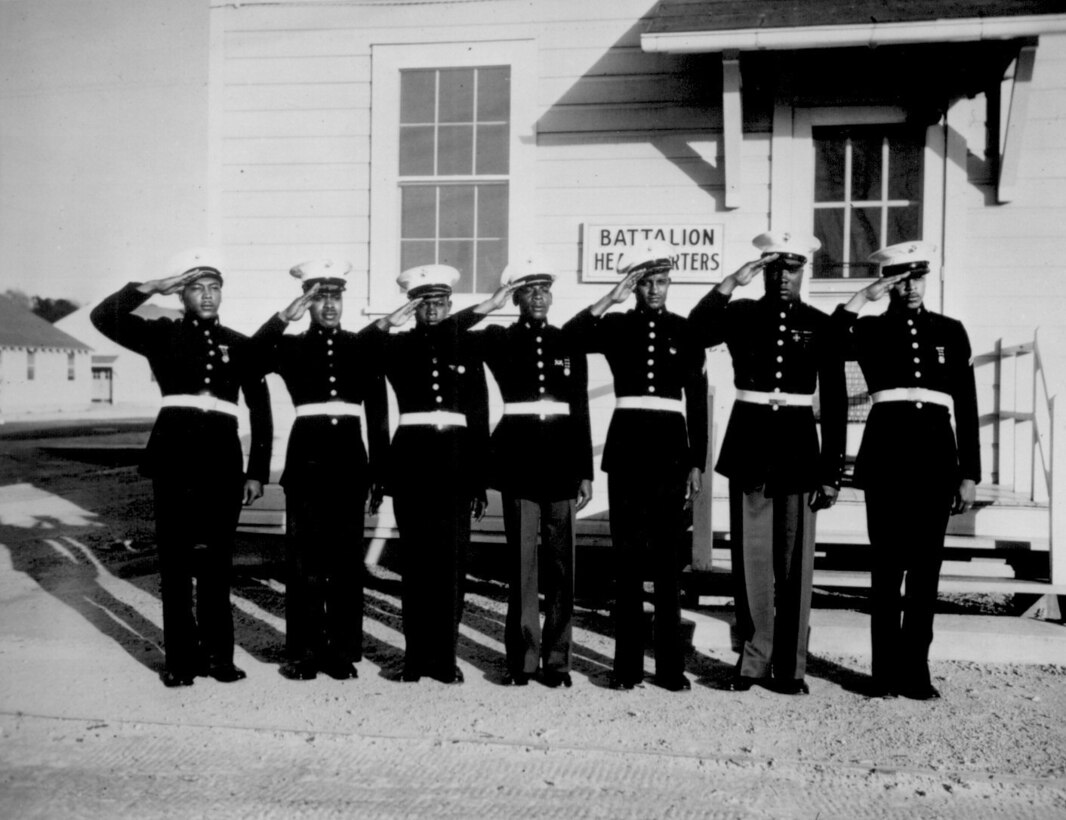 A group of the black volunteers in their dress uniforms, May 1943. Although a dress uniform was not a part of the regular equipment, most of the black Marines spend $54 out of their pay for what is generally considered the snappiest uniform in the armed services. (Photo by Roger Smith/Released)