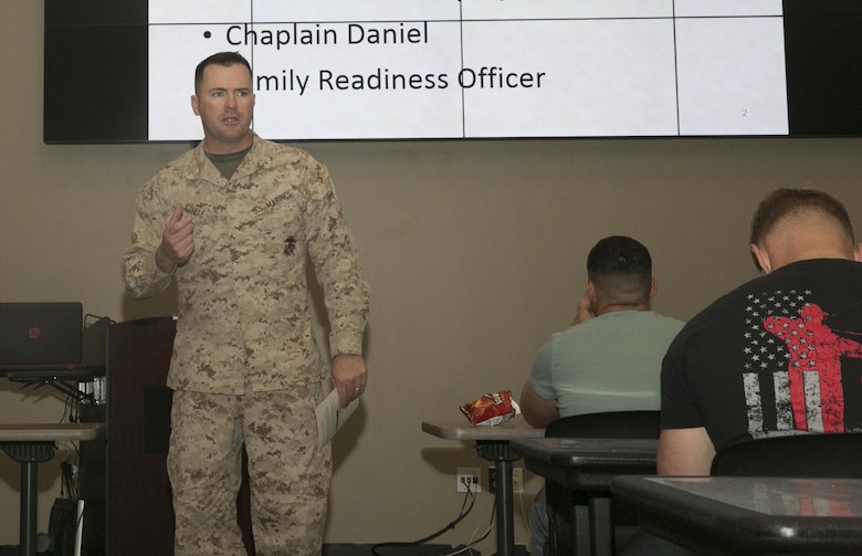 Lt. Col. Christopher Steele, commanding officer, 2nd Battalion, 7th Marine Regiment, talks to the Marines, sailors and their families about the importance of being prepared during the units’ pre-deployment brief at building 1707 aboard the Combat Center, March 2, 2016. (Official Marine Corps photo by Thomas Mudd/Released)