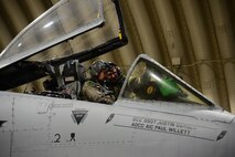U.S. Air Force Maj. Matthew Cichowski, 25th Fighter Squadron pilot, and Airman 1st Class Jonathan Wirkkala, 25th Aircraft Maintenance Unit assistant dedicated crew chief, conduct final preflight checks prior to a simulated combat sortie during exercise Beverly Midnight at Osan Air Base, Republic of Korea March 9, 2016.(U.S. Air Force photo by Staff Sgt. Rachelle Coleman/Released) 
