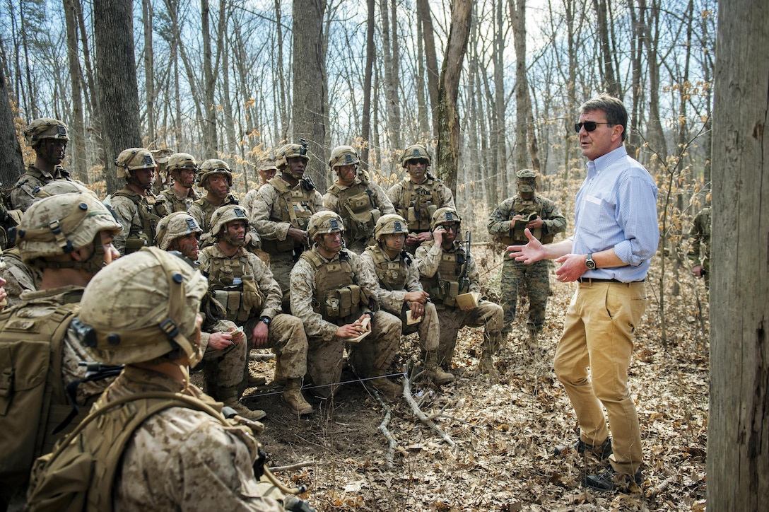 Defense Secretary Ash Carter speaks to Marines participating in a platoon defense demonstration on Marine Corps Base Quantico, Va., March 9, 2016. Carter visited Quantico to observe Marine Corps training and speak with Marines. DoD photo by Air Force Senior Master Sgt. Adrian Cadiz<br /><br /><a target="_blank" href="https://www.flickr.com/photos/secdef"> Click here to see more images on Secretary Carter's Flickr page. </a>