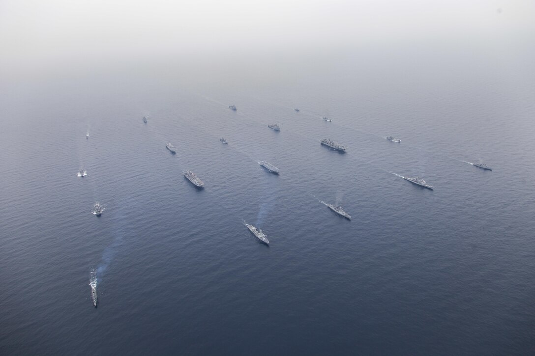 Ships assigned to the Bonhomme Richard and Boxer Expeditionary Strike Groups (BHRESG/BOXESG) along with the Republic of Korea (ROK) Flotilla 5 transit in a formation during a photo exercise commencing exercise Ssang Yong 2016. Sailors and Marines of ROK Navy, Marine Corps, Expeditionary Strike Group (ESG) 7, Commander, Task Force (CTF) 76 and 3rd Marine Expeditionary Brigade (3D MEB), along with 7th ROK Marine Corps Regimental Landing Team 7 (ROKMC RLT-7), Australian Army and Royal New Zealand Army forces are participating in Ssang Yong 2016, the largest combined amphibious exercise of its kind to date, designed to strengthen interoperability and working relationships across a wide range of military operations from disaster relief to complex expeditionary operations. (U.S. Navy photo by Commander, Amphibious Squadron 11, Captain Ed Thompson/Released)