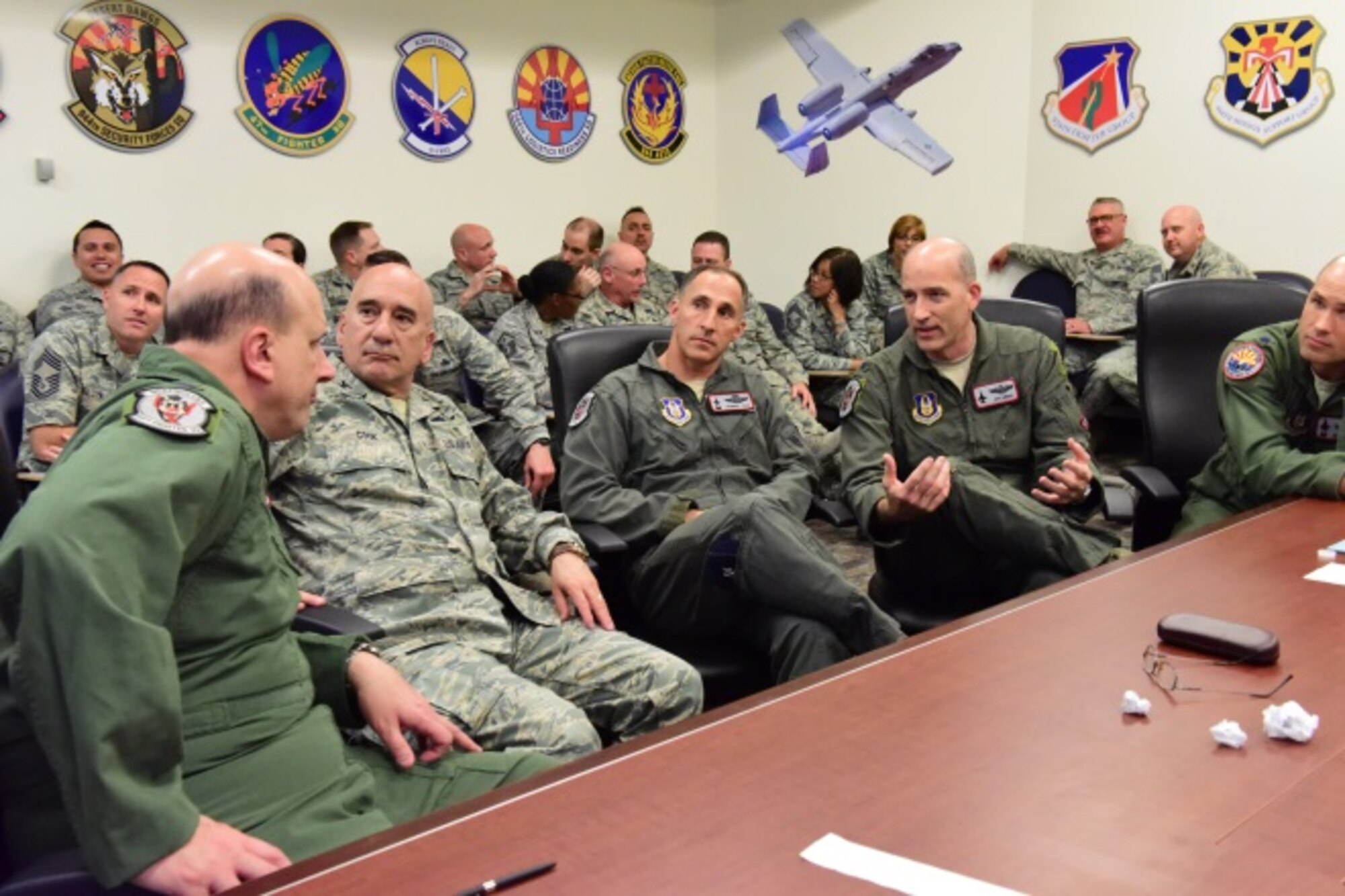 Leadership from the 944th Fighter Wing break into small groups during Green Dot training March 5, 2016. The Green Dot program is the first step of a five-year strategy to decrease interpersonal violence across the service. (U.S. Air Force photo by Staff Sgt. Lausanne Kinder)