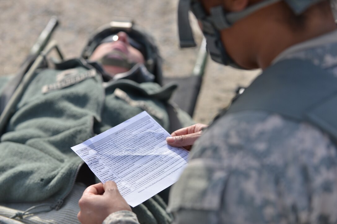 A U.S. Army Soldier with the 558th Transportation Company prepares to call into the 159th Aviation Regiment, 5th Battalion for a 9-line medical evacuation request during an exercise at Fort Eustis, Va., March 3, 2016. The Soldiers practiced calling in a 9-line to familiarize themselves with the terms and requirements of the request. (U.S. Air Force photo by Staff Sgt. Natasha Stannard)