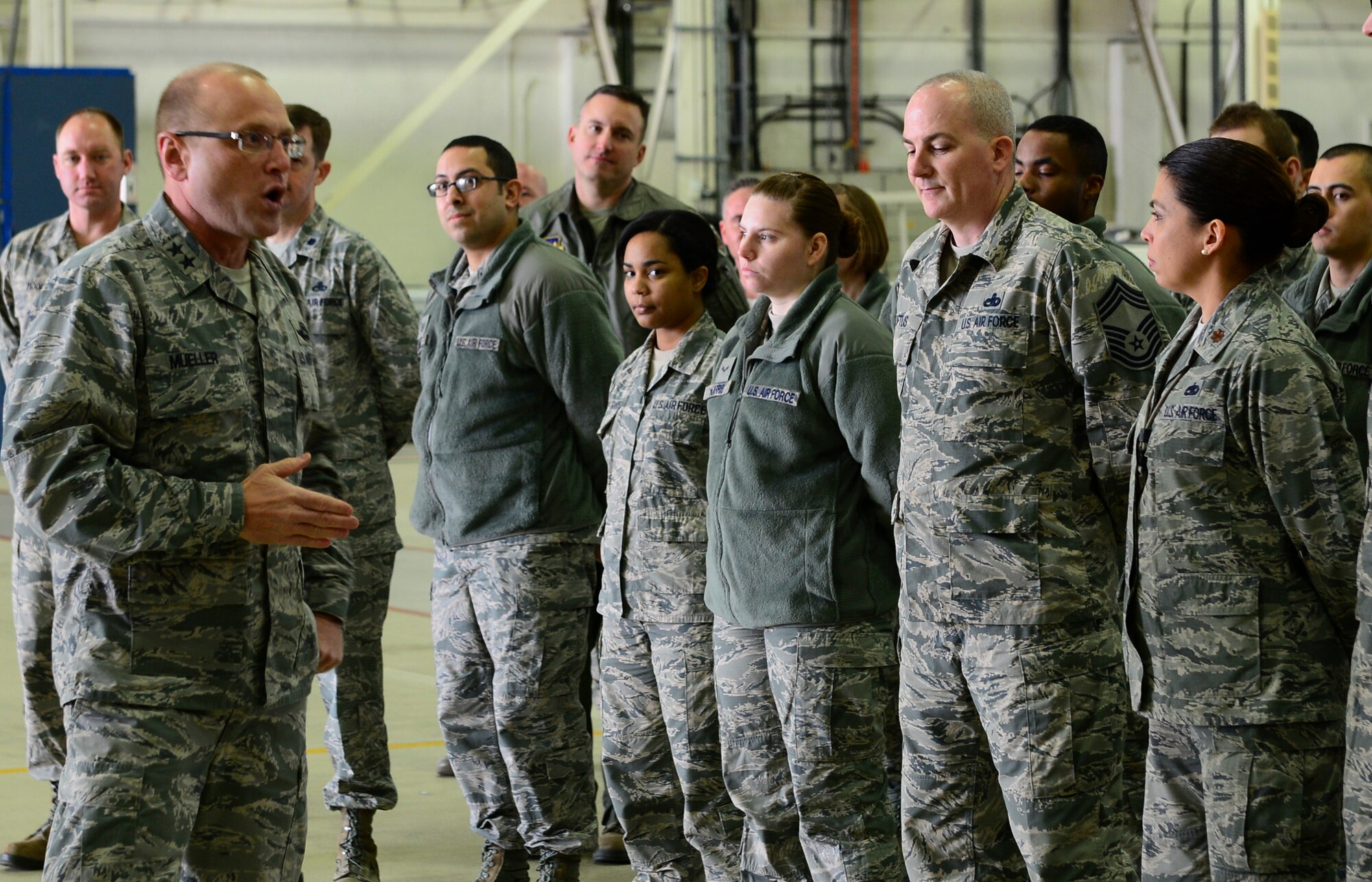 Maj. Gen. Andrew Mueller, Air Force Chief of Safety, briefs Airmen from throughout the 48th Maintenance Group about the importance of safety in and out of the work environment at Royal Air Force Lakenheath, England, March 7, 2016. During his visit with Liberty Wing leadership, they discussed the development, execution and evaluation of Air Force aviation, ground, weapons, space and system mishap prevention and nuclear surety programs. (U.S. Air Force photo by Senior Airman Dawn M. Weber/Released)