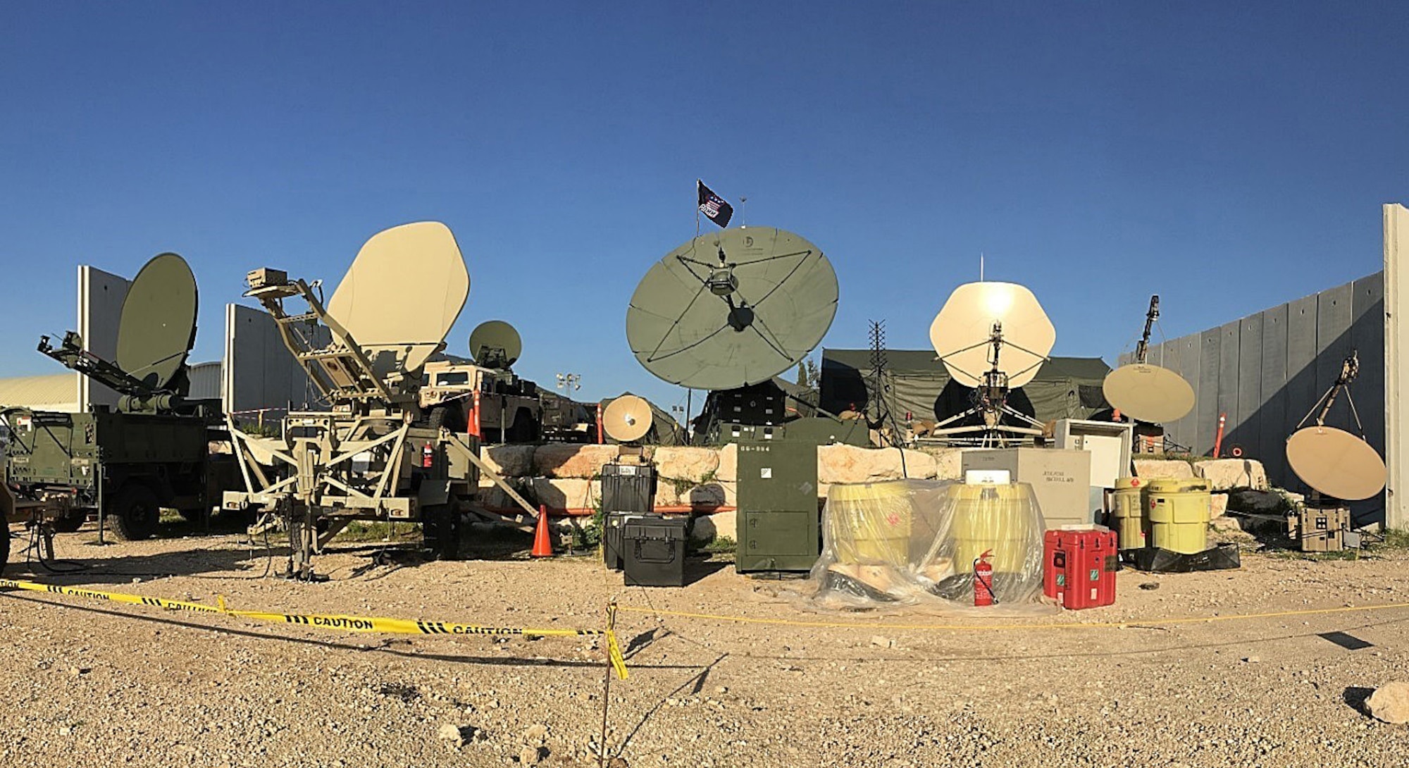 A mass communication center was setup by three combat communications units in support of exercise Juniper Cobra 16, in Israel. This is the first time Airmen from the 1st Combat Communication Squadron (CBCS), 52nd CBCS and soldiers from the 44th Expeditionary Signals Battalion have worked together in a single exercise. ???It normally only takes one unit, but with this large exercise they wanted to deploy multiple units to see how it works in the event that we would have to support a real-world situation,??? said Staff Sgt. Shirim Bishop, 1st CBCS tactical network operations supervisor temporarily deployed from Ramstein Air Base, Germany. (U.S. Air Force photo by Staff Sgt. Stephanie Longoria/Released)